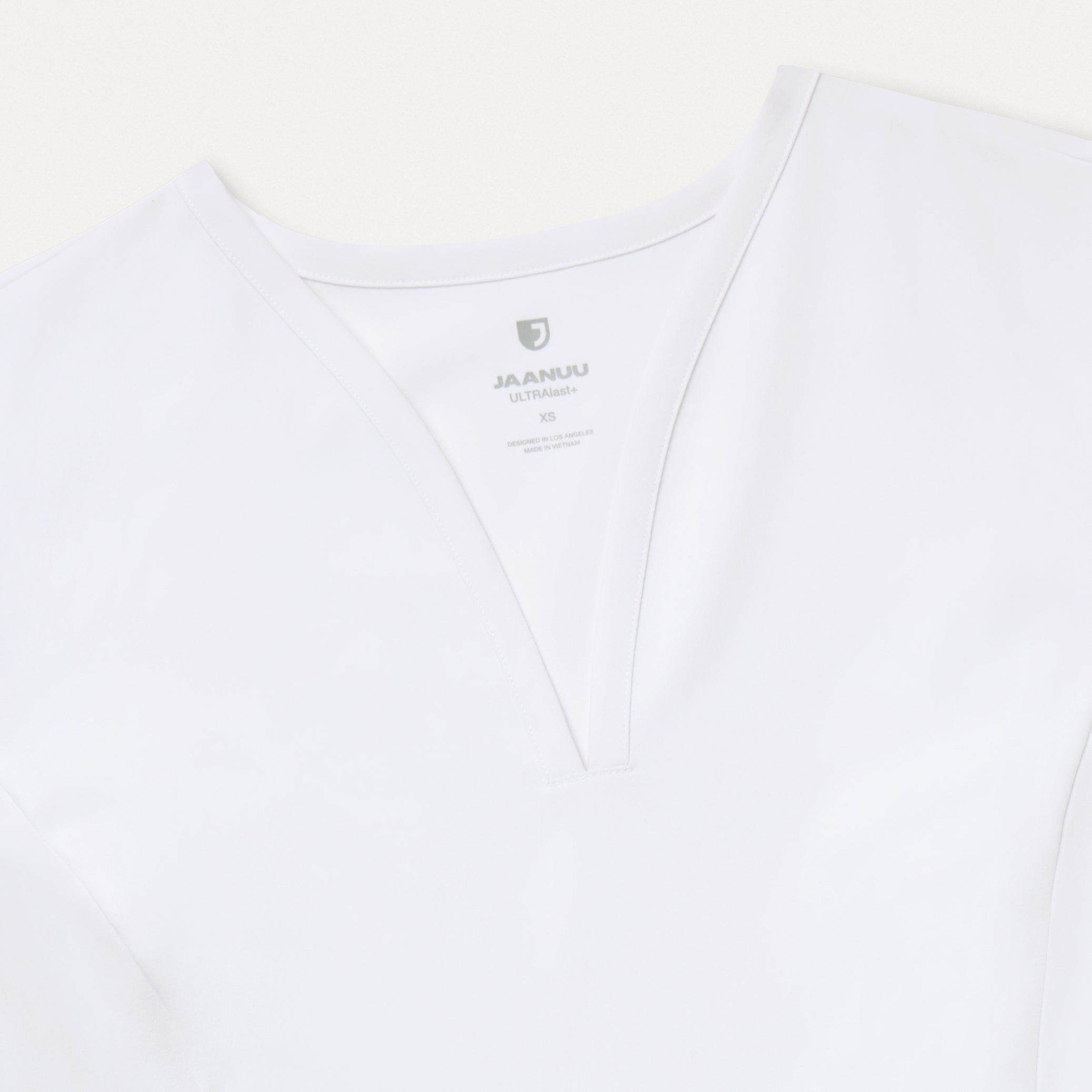 Calix Fit & Flare Scrub Top - White